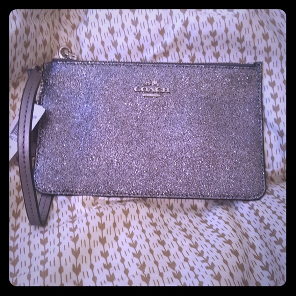 Coach Handbags - NWT Coach wristlet silver sparkly glitter